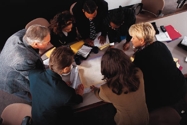 Project team collaborating around a table